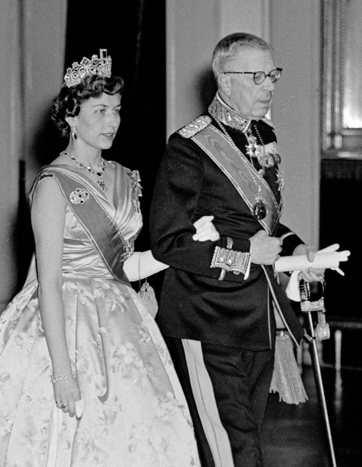 Princess Astrid of Norway and King Gustaf VI Adolf attend a state banquet at the Royal Palace in Oslo, March 1960 (NTB/Alamy)