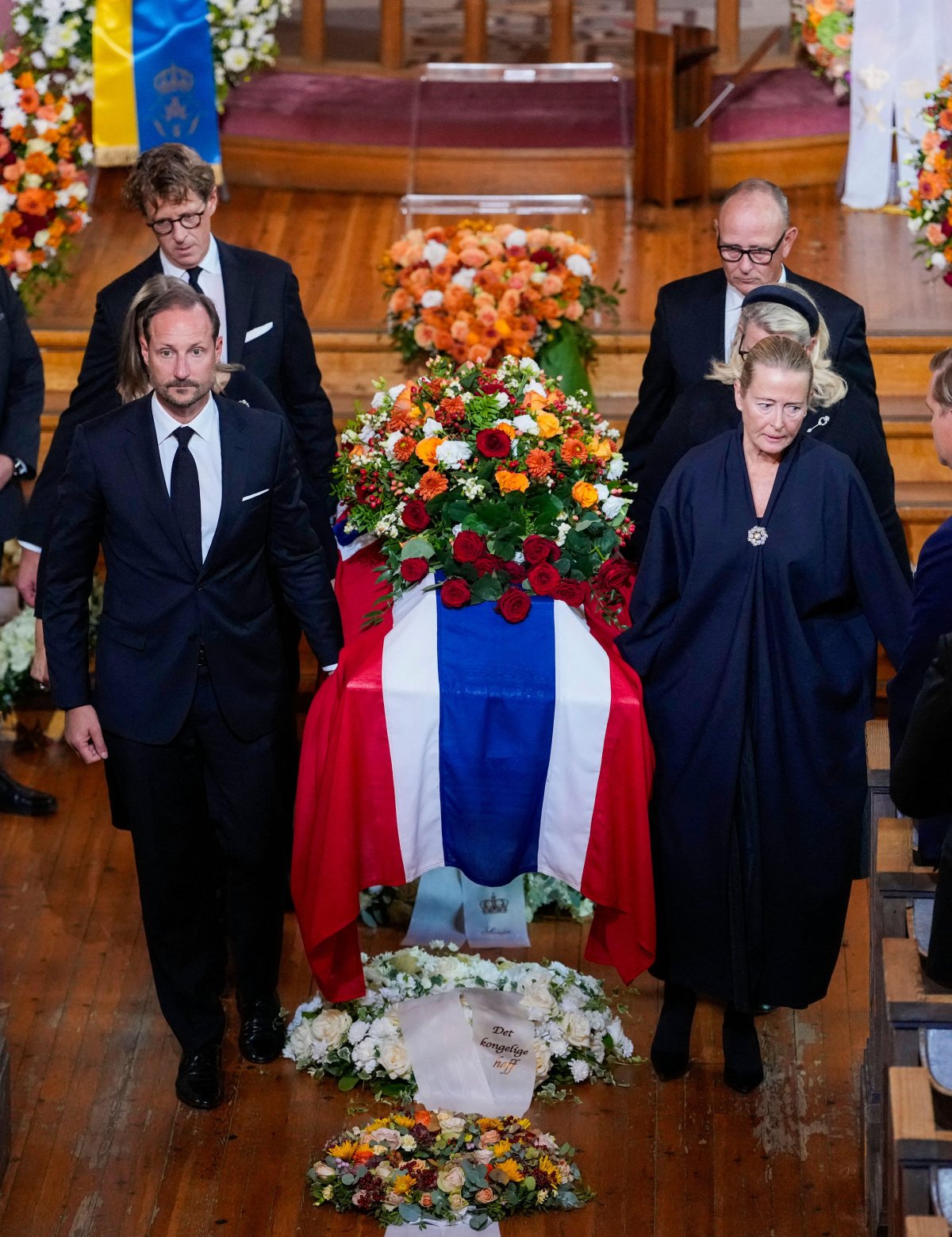 The King of Norway and Princess Astrid's children carry her coffin from Ris Church in Oslo after her funeral service on September 23, 2026 (Ole Berg-Rusten/NTB/Alamy)