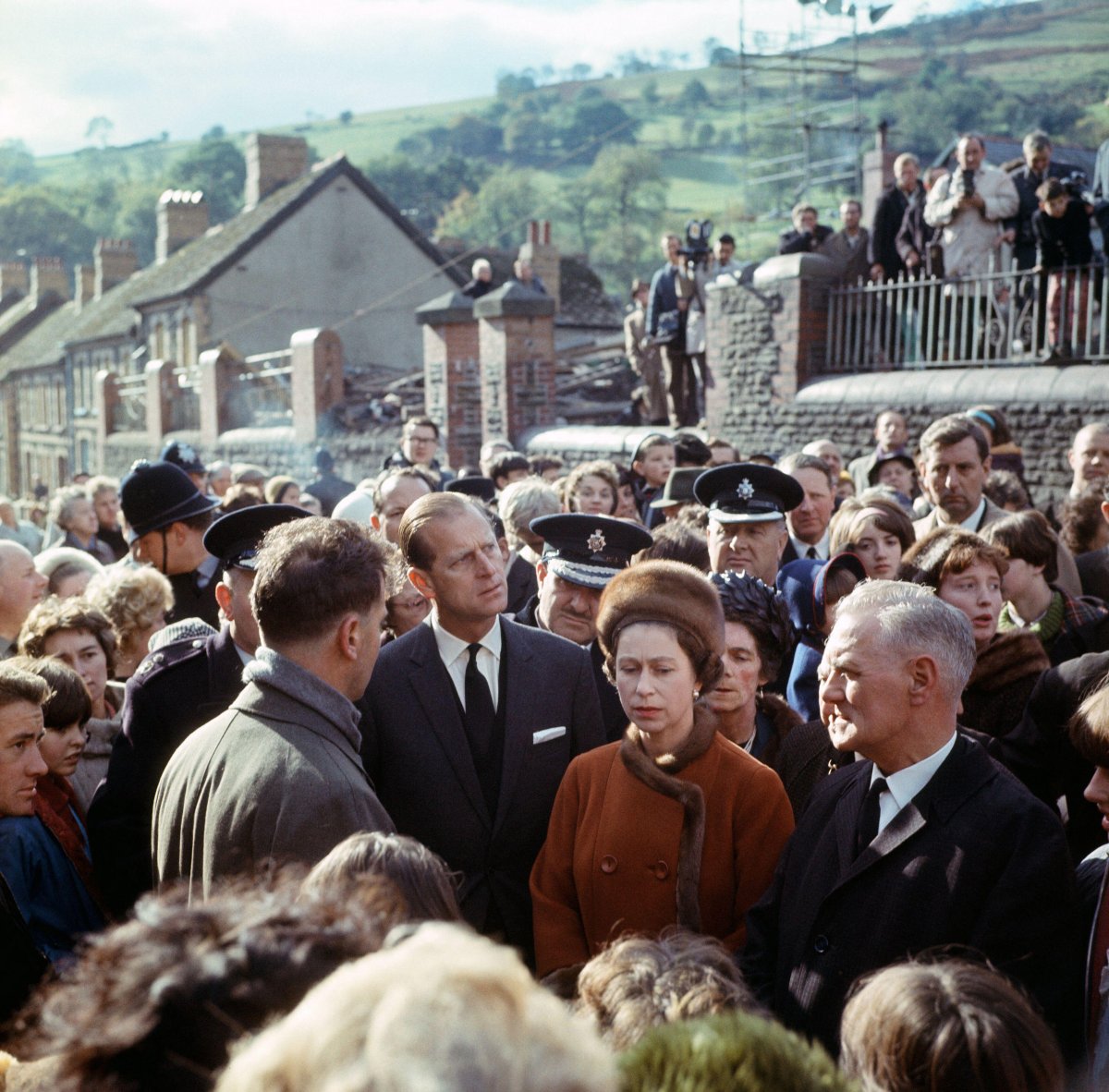 The Queen and the Duke of Edinburgh are pictured in Aberfan on October 29, 1966 (Mirrorpix/Alamy)