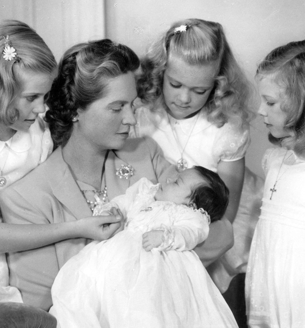 Princess Sibylla of Sweden, with Princesses Margaretha, Birgitta, and Desiree, holds her infant daughter, Princess Christina, 1943 (Classic Picture Library/Alamy)